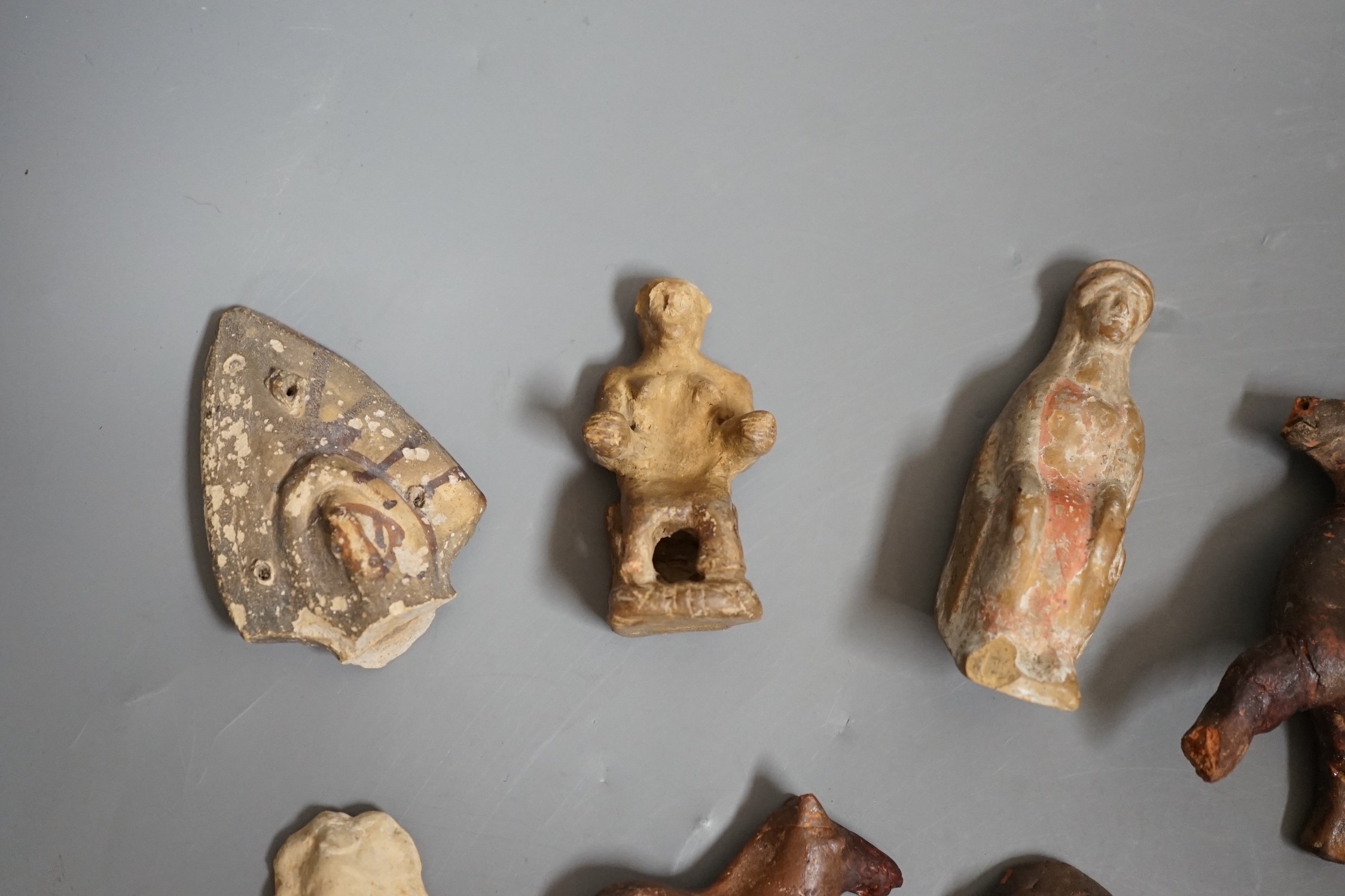 Assortment of pottery antiquities and fragments